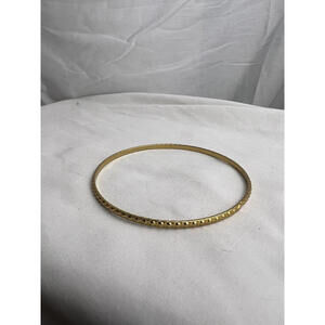 Vintage gold toned circular patterned thin bracelet